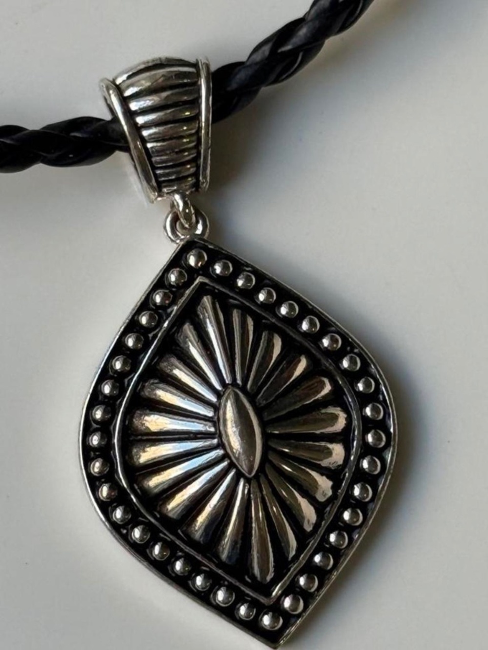 Ornate Silver Pendant on Braided Black Cord Necklace